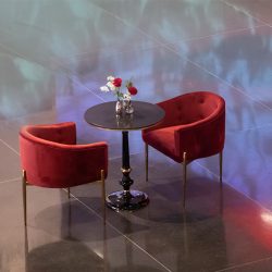 red-sinatra-chairs-with-black-gloss-brasserie-table